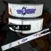 Tom & Jerry weight lifting belt with Premium Leather shown on gym equipment