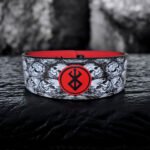 Custom Berserk leather gym belt featuring Guts, skull motif, Japanese text, and red interior with SBD-style black buckle.